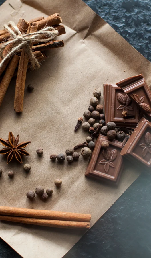 Illustration d'une table avec du chocolat et des épices